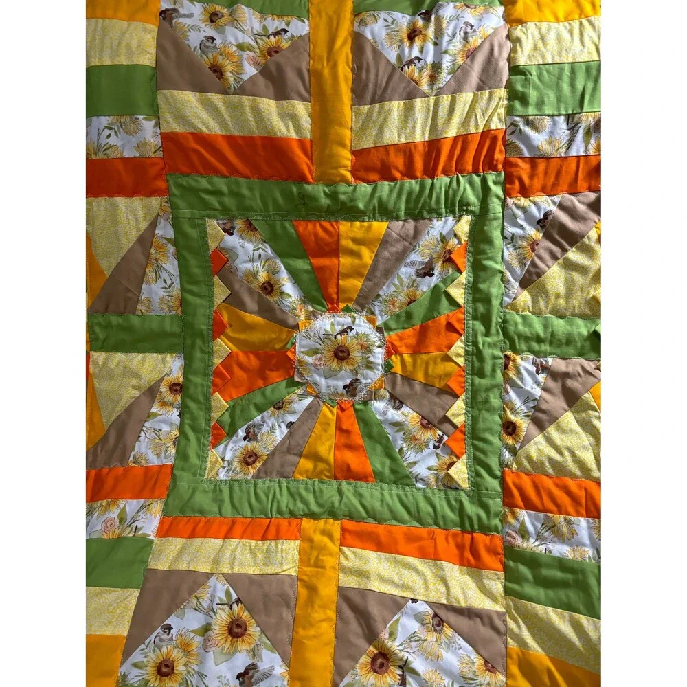 Cheerful,happy, colorful sunflower theme lap quilt or baby quilt. 41” x 40”